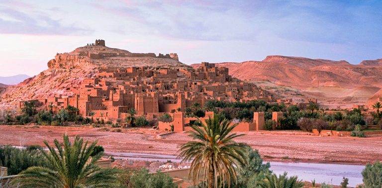 Ait Ben Haddou citadel in Ouarzazate, Morocco, showcasing ancient earthen architecture against a desert backdrop.